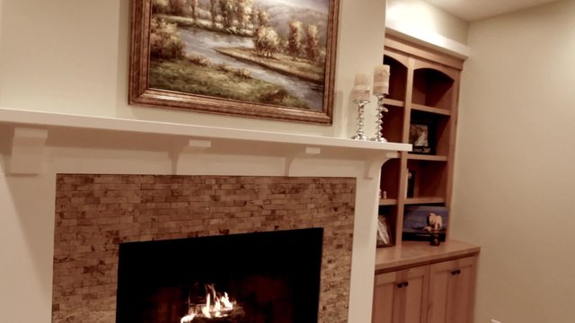 cozy fireplace in a sitting room jib shot