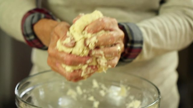 woman making pie crust dough