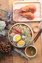 Instant noodles soup put egg and shrimp