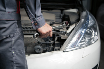 Obraz premium Car mechanic. Auto repair service.