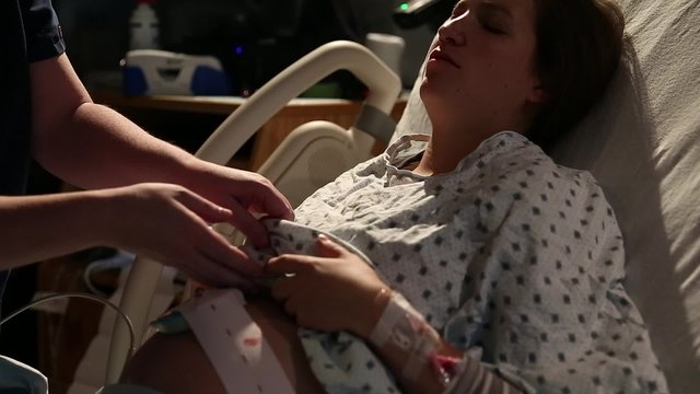 a woman in labor and delivery at the hospital