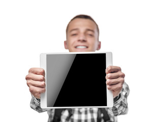 Young man using tablet pc