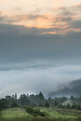 Amazing mountain landscape with fog
