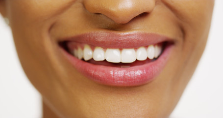 Close up of African woman with white teeth smiling