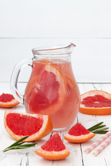 Detox fruit infused flavored water with cherry, lemon and mint. Refreshing summer homemade cocktail. Clean eating