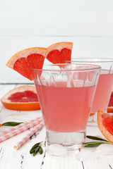 Detox fruit infused flavored water with cherry, lemon and mint. Refreshing summer homemade cocktail. Clean eating