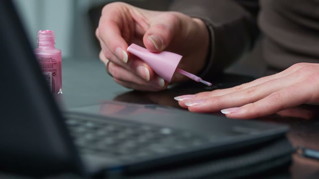 Polish nails while working with computer