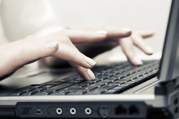 Business woman using laptop