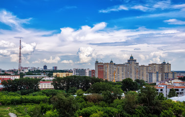 Fototapeta premium large apartment house on the background of blue sky