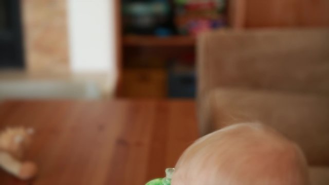 little boy watching movie on a tablet