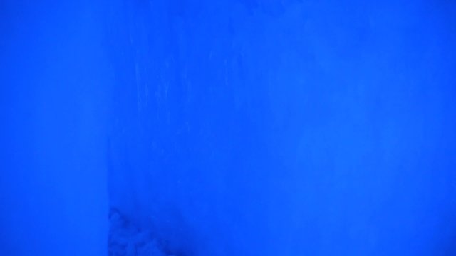 walking through frozen ice castle walls