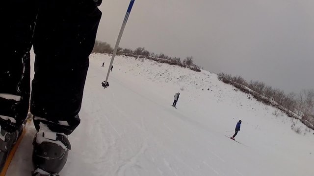 downhill skiing through fresh snow