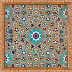 Flowers Motif in Islamic Iranian Pattern made of Tiles and Bricks
