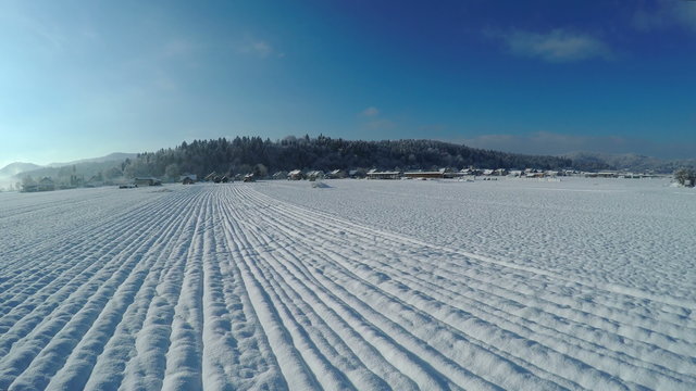 Snow field on a sunny day aerial shot