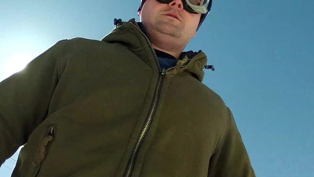 man skiing from waist up
