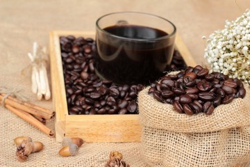 Roasted coffee beans with hot coffee