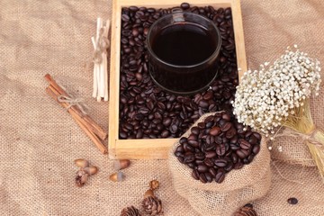 Roasted coffee beans with hot coffee