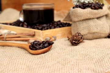 Roasted coffee beans with hot coffee