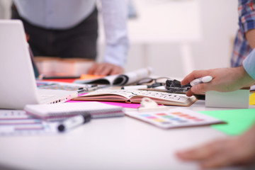 Young business people working at office on new project