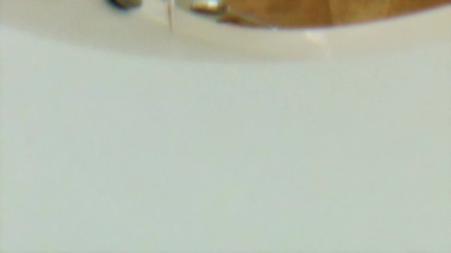 faucet filling the bathtub pov of water covering camera