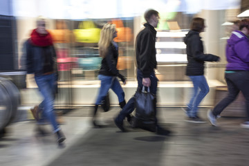 Intentional blurred image of people in shopping center