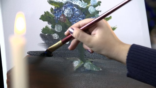 Slow motion painting on canvas with candlesticks