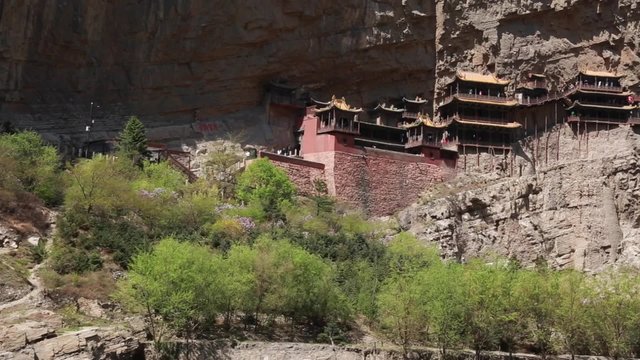 at the hanging temple at datong china with tourists