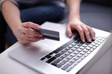 businesswoman using his credit card for an online transaction