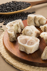 Foot raw pork on wooden background