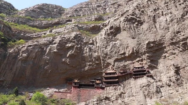 at the hanging temple in datong china with tourists