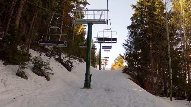 riding up the ski lift