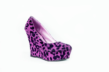 Beautiful pink / purple leopard high heels / pumps in studio (background, sexy, fashion wallpaper)