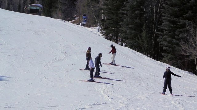 Beggining Skiers Practicing