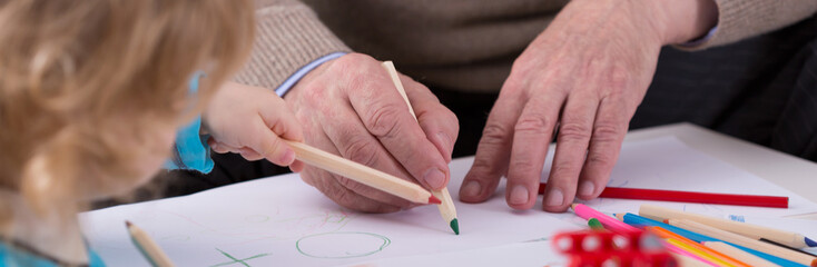 Grandfather making a picture © Photographee.eu