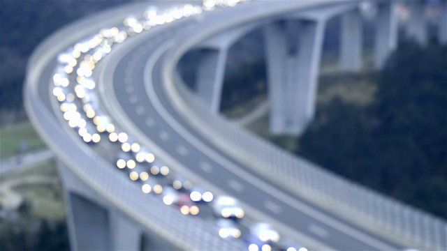 Traffic jam vehicles on bridge out of focus