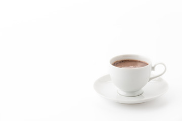 a cup of chocolate on white