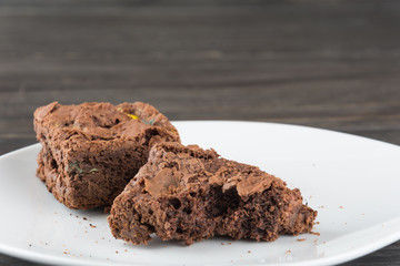 brownies in plate on wood table