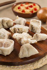Foot raw pork on wooden background