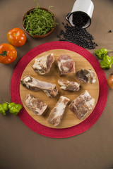 Raw pork rib on wooden background