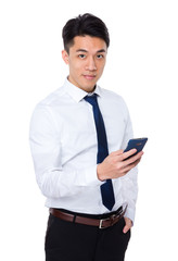 Young businessman use of the mobile phone