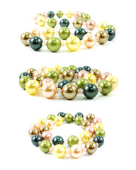pastel colored bead and pearls on a white background