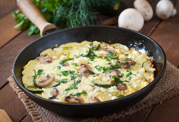 Frittata with mushrooms, zucchini and cheese