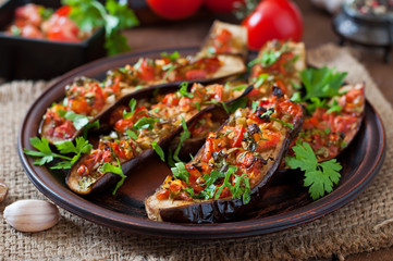 Baked eggplant with tomatoes, garlic and paprika