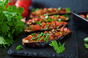 Baked eggplant with tomatoes, garlic and paprika