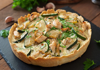 Quiche with chicken and zucchini with herbs