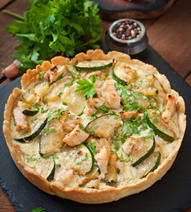 Quiche with chicken and zucchini with herbs