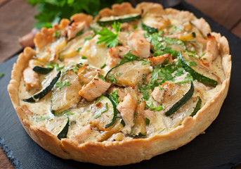 Quiche with chicken and zucchini with herbs