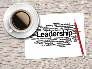 Coffee, Pencil And A Note Contain Word Clouds Of Leadership And