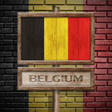 Belgium flag wooden sign with brickwall background