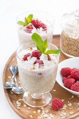 healthy dessert with oatmeal, whipped cream and raspberries